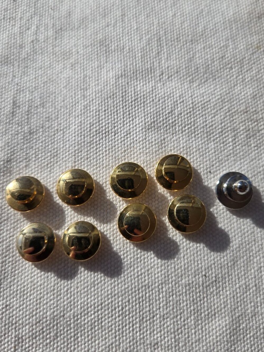9 Metal Gold Toned (1 is silver toned) Pin Backs New Old Stock